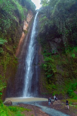 Sidoharjo Waterfall Located in Middle of Forest in Menoreh Highland, Indonesiaの写真素材