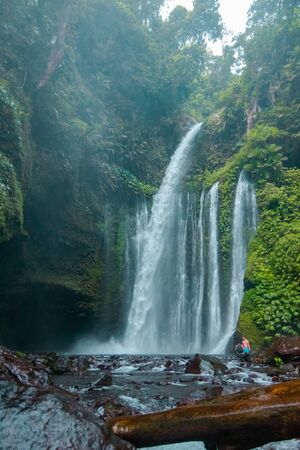 Tiu Kelep Waterfall, One Of The Favorite Destinations Of Tourists Visiting Lombok Island, Indonesiaの写真素材