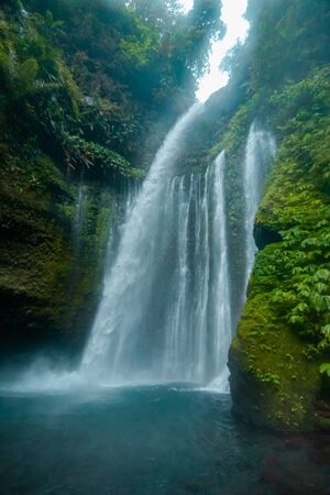 Tiu Kelep Waterfall, One Of The Favorite Destinations Of Tourists Visiting Lombok Island, Indonesiaの写真素材