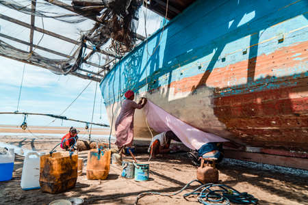 The process of painting and repairing ships in Talisayan, Berau, East Kalimantan, Indonesiaのeditorial素材