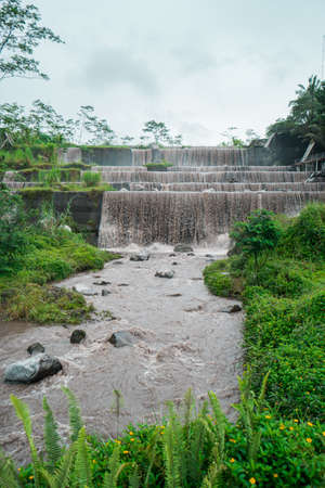 Grojogan Watu Purbo in Sleman, Yogyakarta, Indonesia which has 6 levels of water dam that functions as a sabo dam from Mount Merapi is also a popular attraction for touristsの写真素材