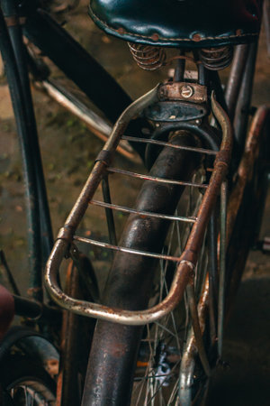 Close up of a classic bicycle full of rust and worn out. Details of old bicycle parts that are neglected and full of dust, look like they are starting to rust and become porousの写真素材