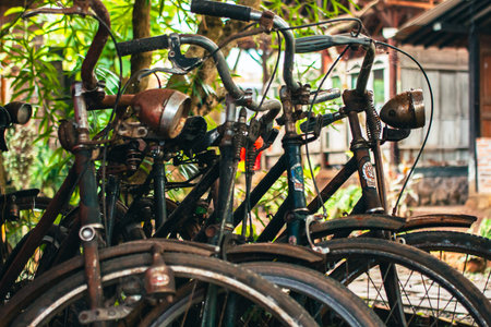 Close up of a classic bicycle full of rust and worn out. Details of old bicycle parts that are neglected and full of dust, look like they are starting to rust and become porousの写真素材