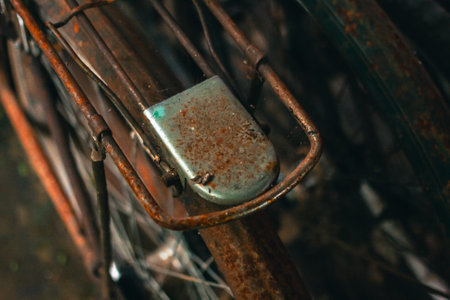 Close up of a classic bicycle full of rust and worn out. Details of old bicycle parts that are neglected and full of dust, look like they are starting to rust and become porousの写真素材