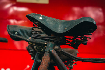 Close up of a classic bicycle full of rust and worn out. Details of old bicycle parts that are neglected and full of dust, look like they are starting to rust and become porousの写真素材