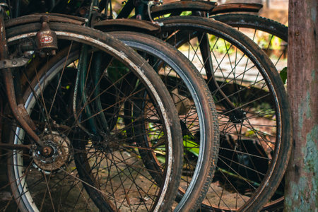 Close up of a classic bicycle full of rust and worn out. Details of old bicycle parts that are neglected and full of dust, look like they are starting to rust and become porousの写真素材