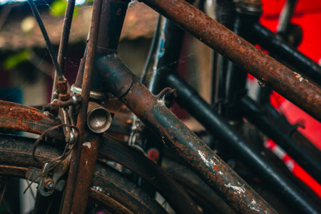 Close up of a classic bicycle full of rust and worn out. Details of old bicycle parts that are neglected and full of dust, look like they are starting to rust and become porousの写真素材