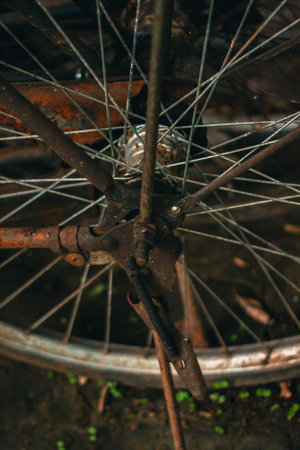 Close up of a classic bicycle full of rust and worn out. Details of old bicycle parts that are neglected and full of dust, look like they are starting to rust and become porousの写真素材