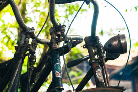 Close up of a classic bicycle full of rust and worn out. Details of old bicycle parts that are neglected and full of dust, look like they are starting to rust and become porousの写真素材