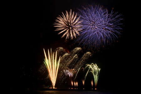 Fireworks launched from the seaの写真素材