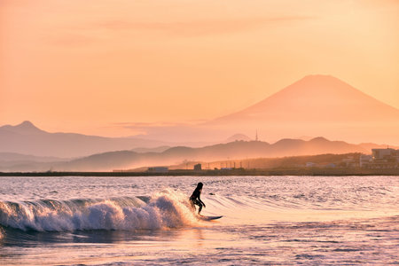Sunset Fuji and Surfer Silhouette