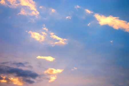 Dramatic sky with colorful clouds at sunset after a storm