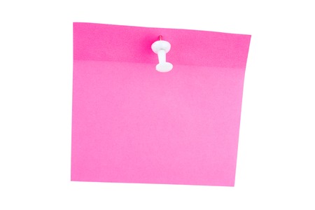 pink paper sheet pinned white pushpin isolated on a white backgroundの写真素材