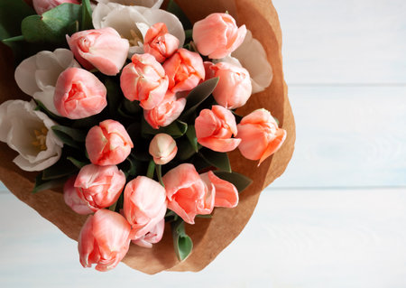 Bouquet with pale pink tulips on a light backgroundの写真素材