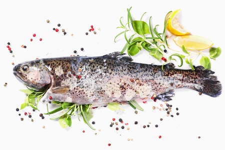 rainbow trout filled with fresh herbsの写真素材