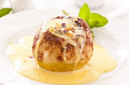 Baked apple with vanilla sauceの写真素材
