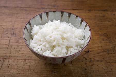 Traditional Japanese Koshihikari Rice as close-up in a bowlの写真素材