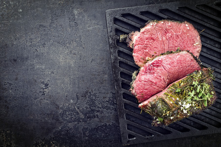 Barbecue wagyu chateaubriand with paprika as close-up on a grillageの写真素材
