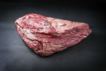 Raw dry aged wagyu beef shoulder clod roast as closeup on black background with copy space の写真素材