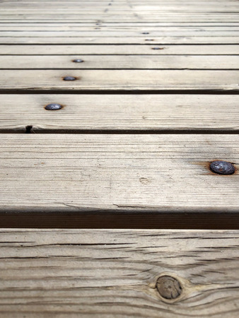 Coniferous wood panels with a rusty mount. Texture for background.の写真素材