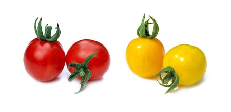 Fresh yellow and red cherry tomatoes on a white background with a sunny shadow. Summer plant. Food product.の写真素材