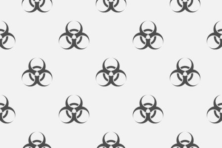 Seamless background pattern of biohazard symbols in gray hues. Pandemic panic.のイラスト素材