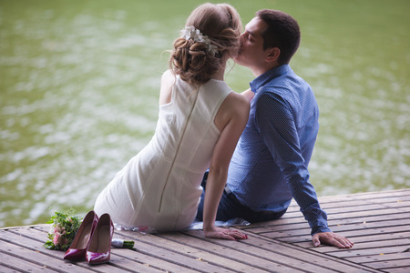 young man and woman on a walk in a city park, happiness, love, tendernessの写真素材