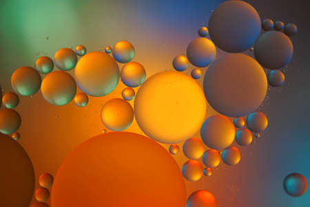 Abstract colorful background. Abstract bubbles in liquid with glow gradient colorsの写真素材