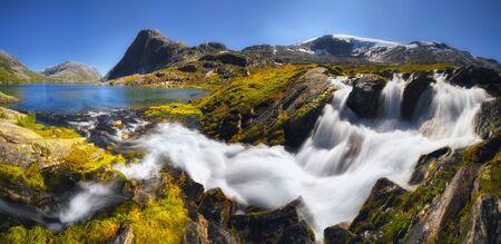 Waterfall in the south of Norway near Geiranger on a sunny day, Romsdalの写真素材