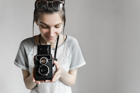 Girl-photographer in search of musicの写真素材