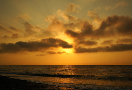 Beautiful sunset on the sea. Sunset on the sea. The sun sets over the sea.の写真素材