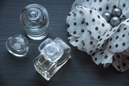 flower and perfume on wood black backgroundの写真素材