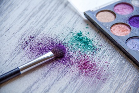 makeup brush and cosmetics, on a wooden backgroundの写真素材