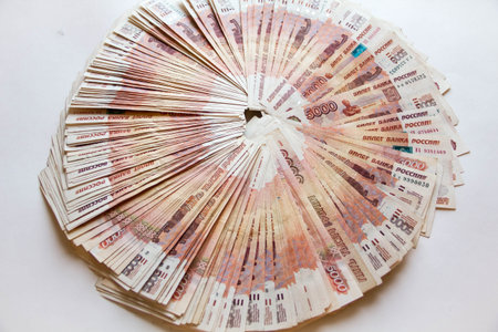 Heap of five thousand russian rubles banknotes as background