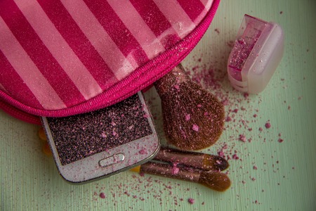 Set of colorful  pink cosmetics wooden table backgroundの写真素材