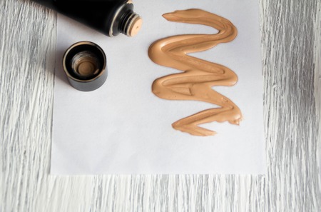 Tone cream cosmetic tube  on wooden backgroundの写真素材