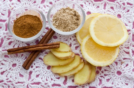 honey nuts ginger garlic apples lemons cinnamon, healthy foods for coldsの写真素材