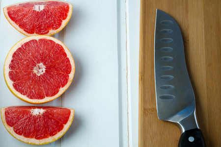 fresh grapefruit on white boards, food wooden background, orange, citrus, fruiの写真素材
