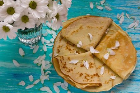 Shrove Tuesday, pancake day, Breakfast, top view, a bouquet  daisiesの写真素材