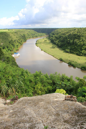Tropical river Chavon in Dominican Republic. Vocation and travel. Ancient village Altos de Chavon - Colonial town reconstructed in Casa de Campo, Dominican Republic.の写真素材