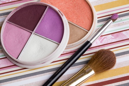 Beautiful bright eye shadows isolated on whiteの写真素材