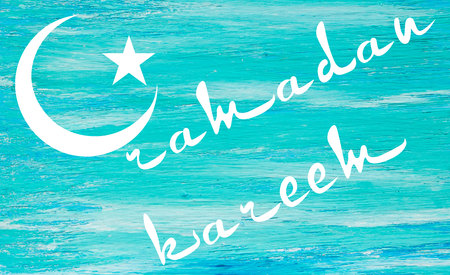 ramadan kareem lettering for postcards, hand-written on a blue background, can be used for adsの写真素材