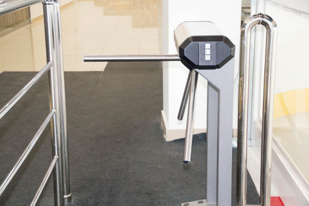 The tripod turnstile with electronic card reader is closed. of asecurity turnstile. Isometric...