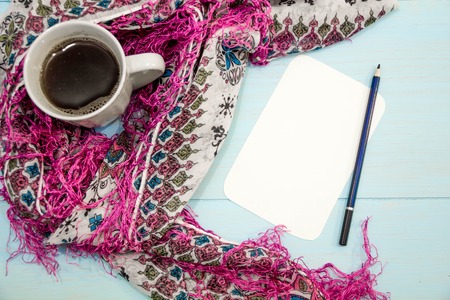 Cosy soft winter background, knitted sweater Cup hot coffee old vintage wooden board. Christmas holidays at home. place for text, Top view flat lay with copy space for slogan or text messageの写真素材