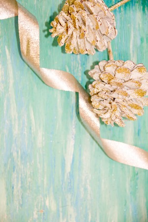 Christmas decorations for the home. Vintage Style. concept of preparing for the holidays, turquoise shabby wooden table background. Top view, flat lay with copyspace slogan text message.の写真素材