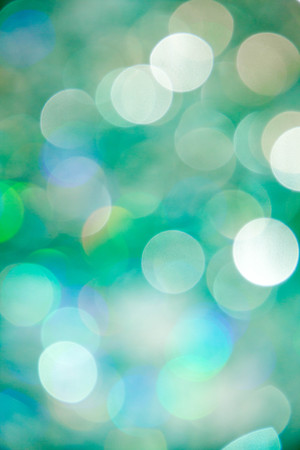 Lights on blue background. holiday bokeh. Abstract. Christmas background. Festive abstract background with bokeh defocused lights and starsの写真素材