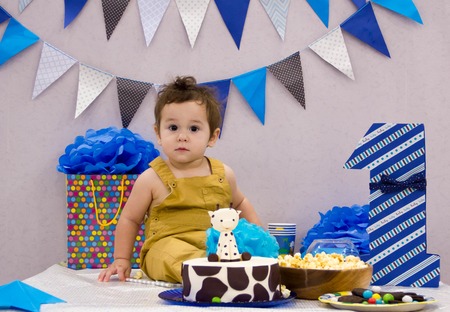 Infant boy's first birthday cake smash Adorable smashing cakeの写真素材