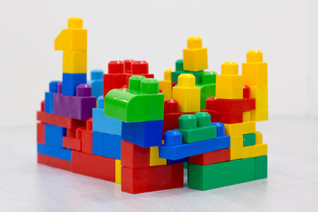 Plastic toy blocks on white background
