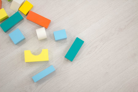 Scattered heap of toy colored wooden bricksの写真素材