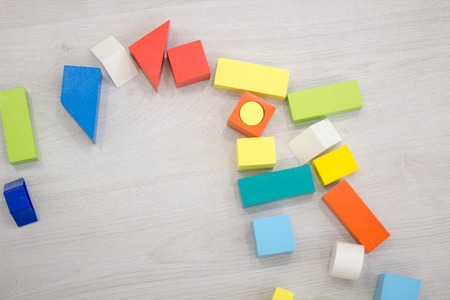 Scattered heap of toy colored wooden bricksの写真素材